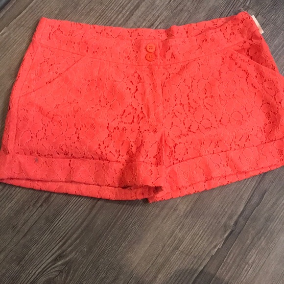 Chino style shorts with lace overlay. - Picture 1 of 4